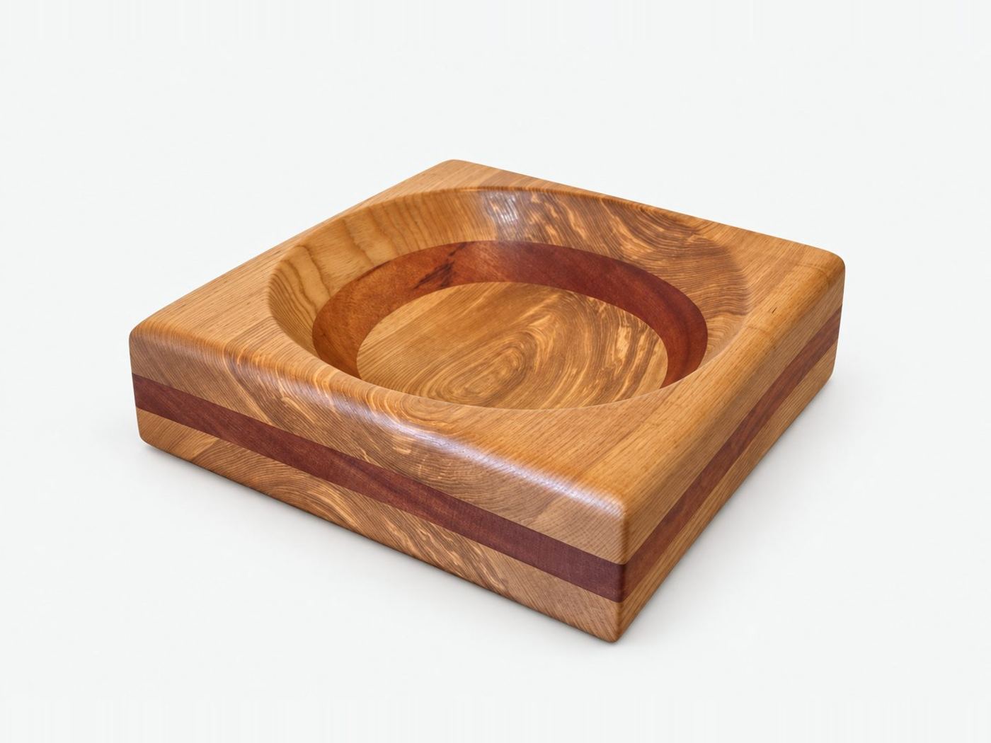Square oak bowl with a round turned well and a contrasting red timber stripe
